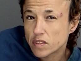 Police: Woman found naked, eating in someone else's home