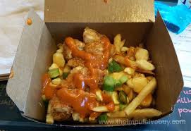 Mcdonald's canada is offering 50% off poutine via the brand's mobile app on december 17, 2020. Review Mcdonald S Spicy Buffalo Chicken Poutine Canada The Impulsive Buy
