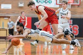 Cascade boys hold off Monroe in OT