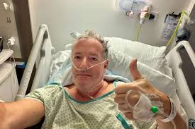 Piers Morgan in hospital recovering from hip replacement after 'tripping on small step' at London restaurant