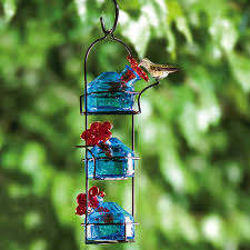 Attract more hummingbirds this year with these beautifully designed feeders. Hummingbird Feeders Yard Envy