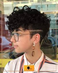 Use sachajuan hair powder ($35) on dry hair to spike up the top and fluff out the shaggy sides. Pixie Sexy Edgy Androgynous Curly Straight Hair