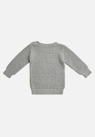 You might have noticed that when you knit stitches, you keep the working yarn at the back of the fabric, and when you purl stitches, the yarn stays at. Miann Co Baby Rib Knit Jumper Dove Miann Co