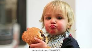 20+ Thousand Child Burger Royalty-Free Images, Stock Photos & Pictures