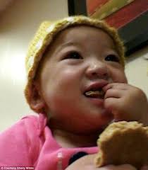 Family with four biological children adopt Chinese baby with cancer after  daughter's plea to help orphans