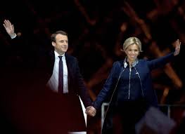 Among the french eager to enjoy their newfound freedom was president emmanuel macron's wife, 68, who donned a vibrant red suit to open the francois pinault collection at the bourse de commerce de. Brigitte Macron Everything You Need To Know About France S New First Lady Vogue