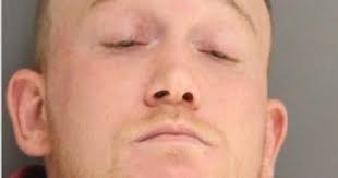 2 charged--including sex offender--in connection to attempted New Year's  Day taxi robbery; 1 still sought