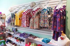 Button Tree Kids Store Photo July 2015 Tea Collection Summer Dresses Display 1102 Pleasant St Worcester Ma 016 Kids Store Kids Boutique Dress Display