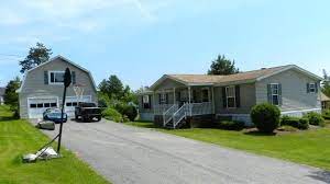Adorable and well maintained 3 bedroom 2 bath double wide. This Setup Is Cute With The House And Detached Two Story Garage I Like The Front Porch Too Real Estate Houses Manufactured Home Home Photo