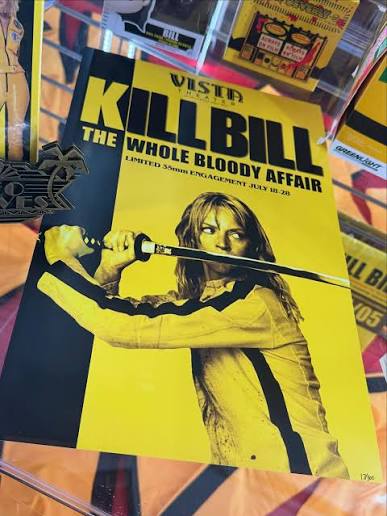 I finally saw The Whole Bloody Affair. These photos are 23-years in the  making… In the first two photos, I'm holding my original ticket stubs for Kill  Bill Vol. 1 (2003) and