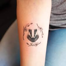 Pin By Emily Dusellier On Tattoos Badger Tattoo Hufflepuff Tattoo Harry Potter Tattoos