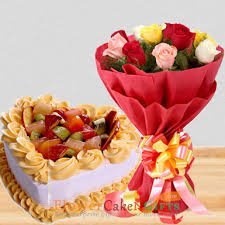 Gifts delivery on same day & midnight from the best gifts shop online. Send Online 1kg Heart Shaped Fruit Cake And Roses Bouquet Order Delivery Flowercakengifts