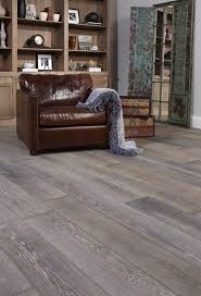 Gray Hardwood Floor With Leather Chair Wood Floors Wide Plank Grey Hardwood Floors Home