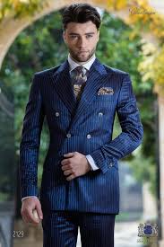Pleated front pant have pockets and zipper and tab closure. Bespoke Suit Double Breasted Blue Pinstripe Mario Moreno Moyano Blue Suit Men Wedding Suits Men Royal Blue Suit