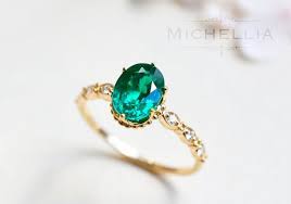 17 Eye Catching Engagement Rings We Could Look At All Day Long Emerald Engagement Ring Emerald Engagement Wedding Rings Oval