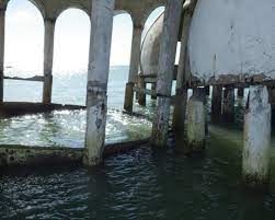 Just off the southwestern coast of florida — all the way down by the everglades, near a small cape called cape romano by marco island — there's a curious sight: Last Chance To See The Cape Romano Dome Homes Before The Sea Swallows Them Whole