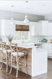 Angled kitchen island and dining table set classic style kitchen with an angled kitchen island combined with a sofa 125 Awesome Kitchen Island Design Ideas Digsdigs