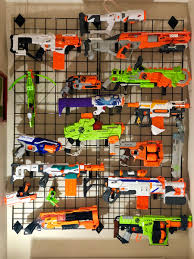 A whole wall devoted to nerf guns. Nerf Gun Wall Reno Dads