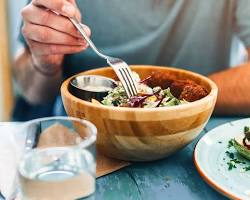 person eating a plant-based meal