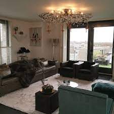 styling penthouse in voorburg bank en vloerkleed van eric kuster fauteuils van baan meubelen verlichting van stout ve interieur ontwerpen interieur meubels