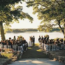 Brides Com By A Lake While Standing Under A Large Tree Might Seem Like The Obvio Lake Wedding Wedding Ceremony Decorations Outdoor Outdoor Wedding Ceremony