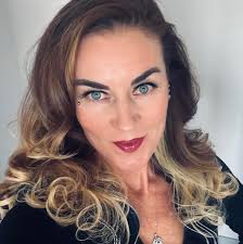 What are the main challenges in running a coaching business?