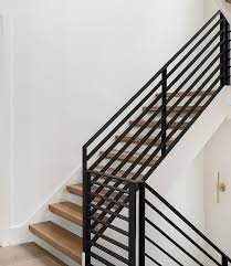 Satin black lite round bars have 1mm thick walls. Metal Railing Staircase Metal Railing The Staircase Features White Oak Treads And A Custom Black Steel Modern Stair Railing Staircase Metal Staircase Railings