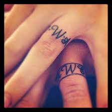 Pin By Mandy Davis On Ink Love Wedding Band Tattoo Tattoo Wedding Rings Wedding Ring Tattoo