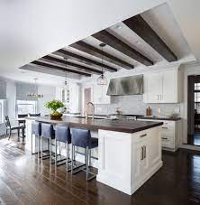 You could add some faux wood beams to it. Beams In Tray Ceiling Houzz
