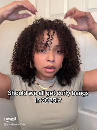 Curly Bangs is the answer!