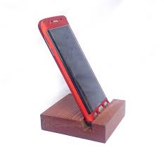 Some stands can fit every smartphone because of their design. Wooden Mobile Stand For Desk Solid Wood Iphone Desktop Holder