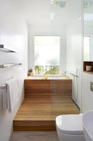 A modern japanese bathroom design has a lot to do with minimalism and the phrase less is the japanese style bathroom design ideas will show you how to apply the minimalist style and create a. Cover A Usual Soaking Tub With Wood And The Shower Space Also To Achieve That Japanese Inspired Look Japanese Bathroom Minimal Bathroom Bathroom Interior