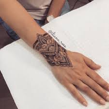 That Mandala Girl On Instagram Made This Pretty Little Cuff Ting For This Gorgeous W In 2020 Hand Tattoos For Women Wrist Tattoos For Guys Wrist Tattoos For Women