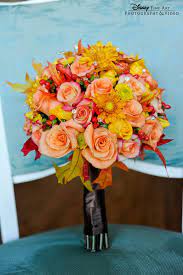 We hear wedding bells ringing! This Fabulous Fall Bouquet Is The Perfect Compliment To A Crisp Weather Soiree Disney Wedding Fall Wedding Bouquets Disney Wedding Disney Fairy Tale Weddings