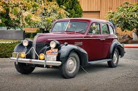 Image result for Trojan Maroon 1939 Oldsmobile