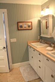 Drill through the grout lines, and attach the strips to the studs in the wall using screws. House Tour Master Bath The Pleated Poppy Cheap Bathroom Remodel Beadboard Bathroom Bathrooms Remodel
