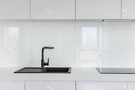 black composite kitchen sink stock