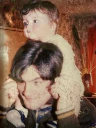 Can someone please restore my son's photo.? It stuck to the glass. Thank  you.