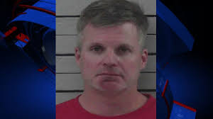 Georgia official charged with DUI, moonshine found in car