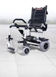 the zinger folds to ten inches in less than a second and fits in virtually any vehicle it is lightweig wheelchair transportation rocking chair pads wheelchair