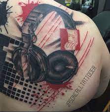 Whether you're planning a large piece or just thinking about your first tattoo we'd love it if you stopped by our store so we can help you plan your next. Photoshop Style Colored Scapular Tattoo Of Headset With Ornaments Tattooimages Biz