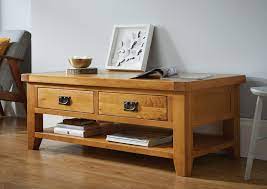 The deep black oak veneer draws the eye in while the contrasting ceramic marble look top add intrigue. Country Oak Large 4 Drawer Coffee Table With Shelf Free Delivery Top Furniture