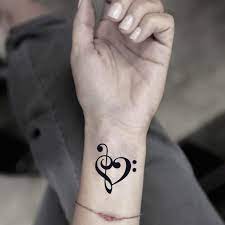 This electric guitar is made out of notes. Music Note Heart Temporary Fake Tattoo Sticker Set Of 2 Amazon De Beauty