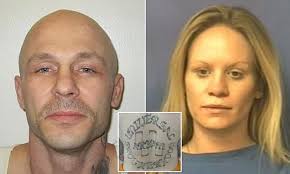 18 members of a white supremacist prison gang are indicted as part of a  'racketeering empire'