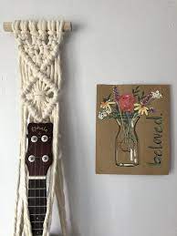 Dream catchers and macrame wall decorations are an exemplary native american style bohemian wall decoration thoughts. Ukulele Hanger Macrame Bohemian Ukulele Display Geometric Ukulele Hook Wall Mount Handmade Wall Art Natural Ukulele Accessories Ukulele Handmade Wall Art Ukulele Accessories