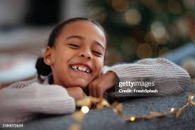 Girl Leaning On Desk High-Res Stock Photo