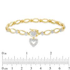 This gorgeous solid oval cable link bracelet is hand made and serves as the perfect canvas for your most of our charms come with an open gold loop (jump ring) which is used to attach them to a bracelet or necklace. Diamond Accent Oval Link With Heart Charm Bracelet In Sterling Silver With 14k Gold Plate 7 25 Zales