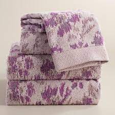 Shop towels featuring delicate embroidery, timeless jacquards, and quality terry for stylish additions to your chic bathroom. Lavender Ikat Floral Ilaria Jacquard Towel Collection Towel Collection Purple Bathroom Accents Purple Bathrooms