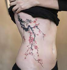 Breaking The Taboo 10 Daring Tattoo Artists From South Korea Blossom Tattoo Rib Tattoo Tattoos For Women