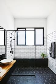 Black and white bathrooms can have their entire look changed just by increasing or decreasing the amount of black you use. Farmhouse Black White Timber Bathroom House Bathroom Bathroom Remodel Master Small Bathroom Remodel